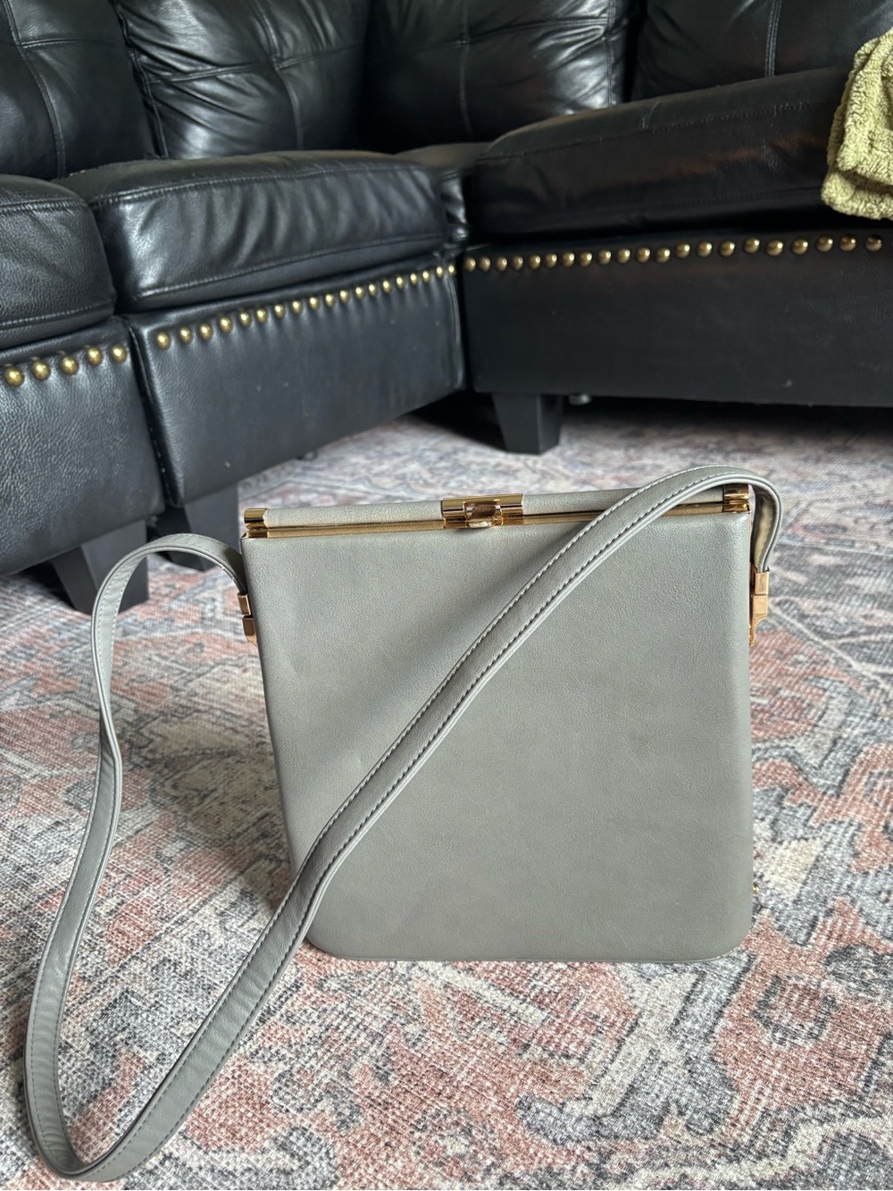 Elegant Gray Crossbody Bag with Gold Frame